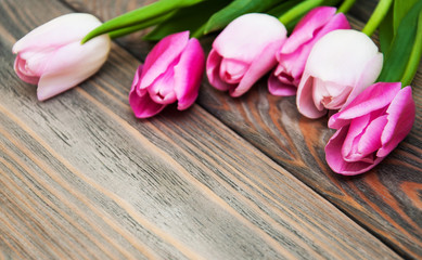 Obraz na płótnie Canvas Border with pink tulips