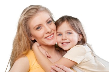 Mom. CLoseup portrait of happy  white mother and young daughter