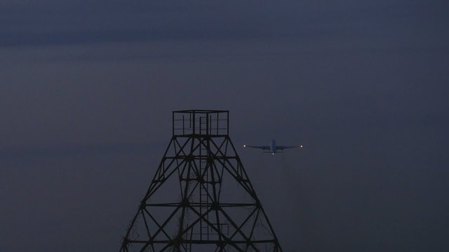 Closeup of landing airplanes at Narita Airport