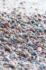 Stones on beach and sea water