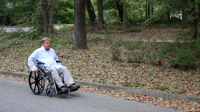 Disabled Man Using Wheelchair