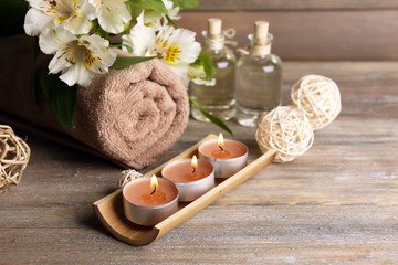 Beautiful spa composition with candles and flowers