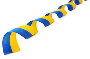 Colorful blue-yellow fabric ribbon  isolated on white