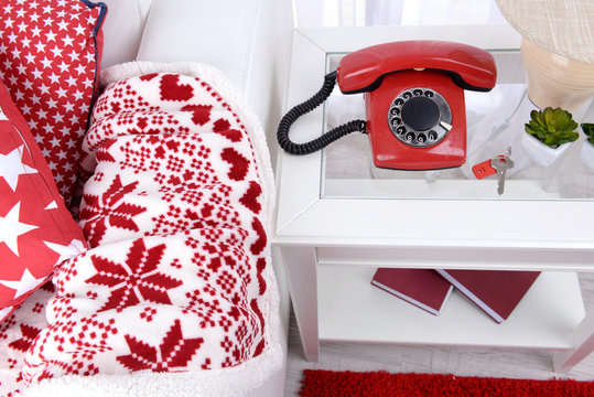 Retro Phone On Nightstand In Room