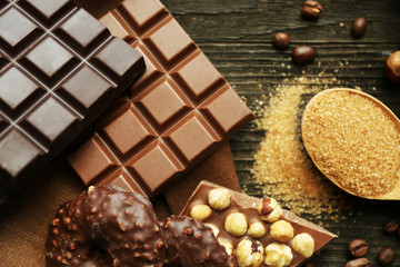 Still life with set of chocolate, nuts and spices