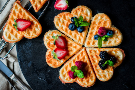 Heart waffles with berries