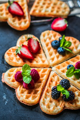 Heart waffles with berries