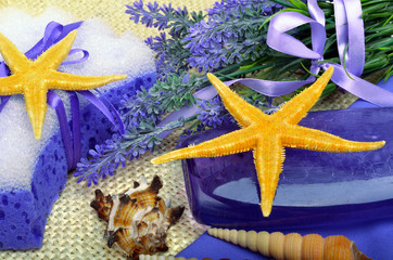 Spa concept, lavender flowers with liquid soap, bathroom accesso