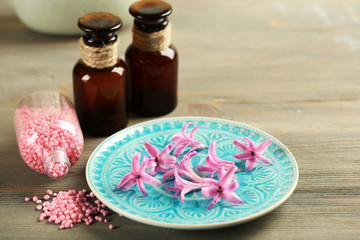 Beautiful spa composition with hyacinth flowers, close up