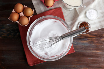 Whipped egg whites and other ingredients for cream