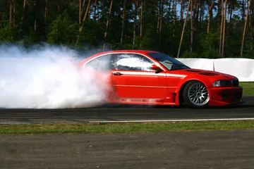 Photo sur Plexiglas Sport automobile pneus de voiture qui fument