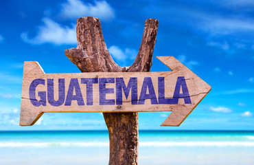 Guatemala wooden sign with beach background
