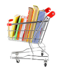 Shopping cart with books isolated on white © Africa Studio