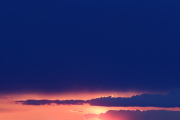 Beautiful view of sunset sky over trees and house