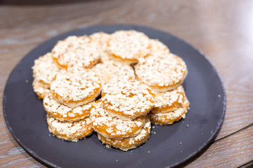 Apricot cookies on wooden table