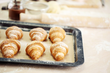 Baking croissant cookies.