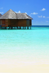 Water villas over ocean background