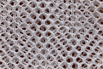 fibers of white fabric.