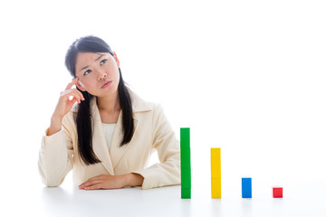 asian businesswoman with building block