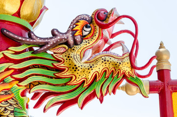 Close up colorful dragon statue. The statue of a Chinese dragon