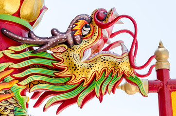 Close up colorful dragon statue. The statue of a Chinese dragon