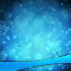 Blue holiday background with snowflakes