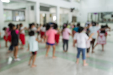 Blurred children in thai dancing class