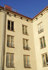 Fototapeta na wymiar Windows and balconies