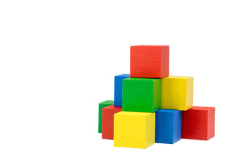 Fototapeta premium Pyramid from wooden colorful cubes