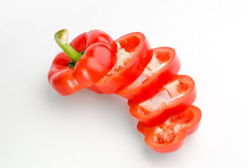 Red bell pepper slice on white background