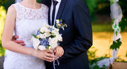 wedding couple and bouquet