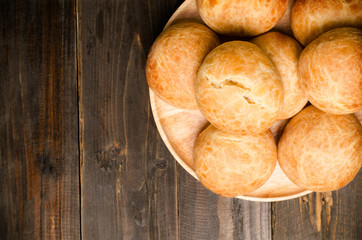 Homemade buns on wooden background