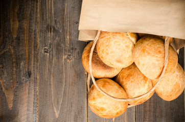 Homemade buns on wooden background