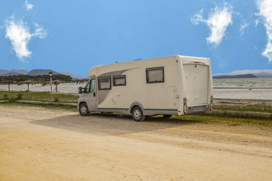 modern caravan beside sea, spring