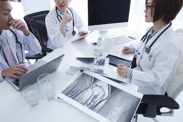 Three doctors meeting