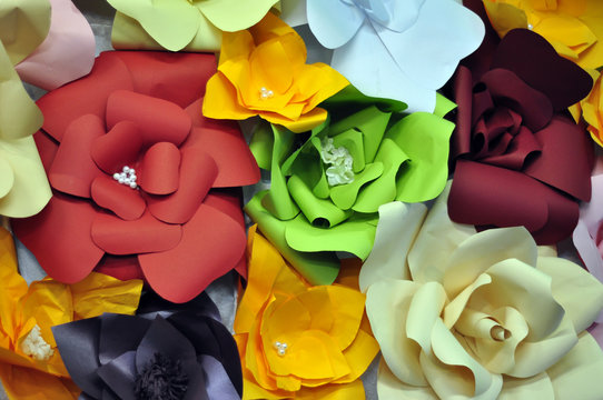 Origami paper flowers in collage