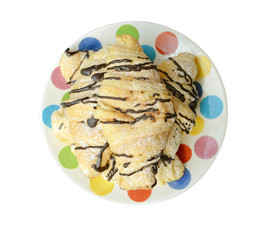 Chocolate croissants, isolated on a white plate