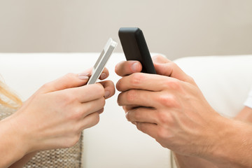 Two Hands With Mobile Phone