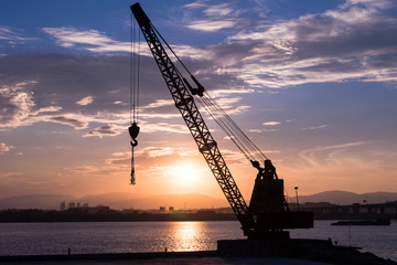 Fototapeta premium Tower crane with steel hook building metal construction