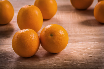 horizontal version fresh ripe tasty orange fruits on wooden boar