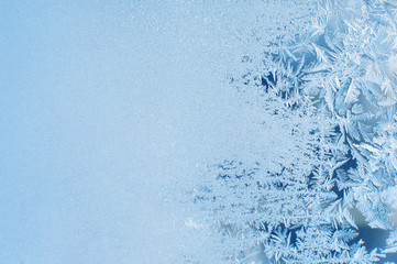 Winter background, frost on window