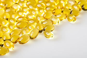 Transparent Vitamins On a White Table