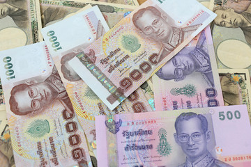 Banknotes of the Japan and Thailand money.