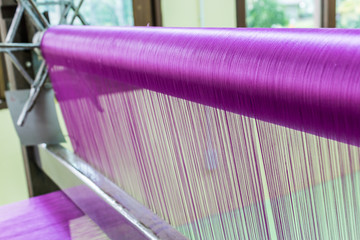 Pink silk weaving.
