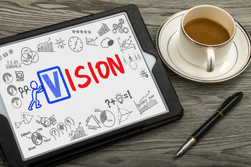 vision concept handwritten on tablet pc