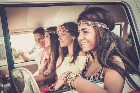 Multi-ethnic hippie friends on a road trip
