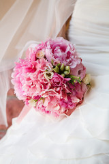 Beautiful wedding bouquet with pink peony