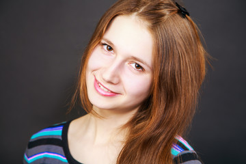 Fototapeta premium Beautiful brunette girl laughing