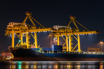 Fototapeta na wymiar container cargo freight ship with working crane bridge in shipya