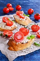 Sandwich with cheese, tomato and Basil